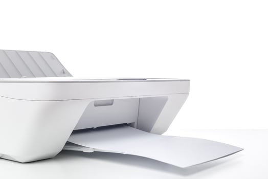 Printer actively producing documents in a modern workspace, highlighting efficiency and technology photo