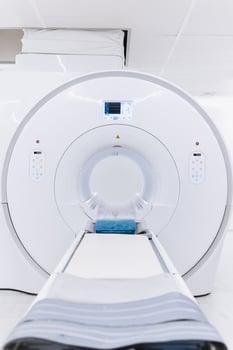 Medical CT or MRI or PET Scan Standing in the Modern Hospital Laboratory. CT Scanner in radiography center. MRI machine for magnetic resonance imaging in hospital radiology. Vertical shot photo