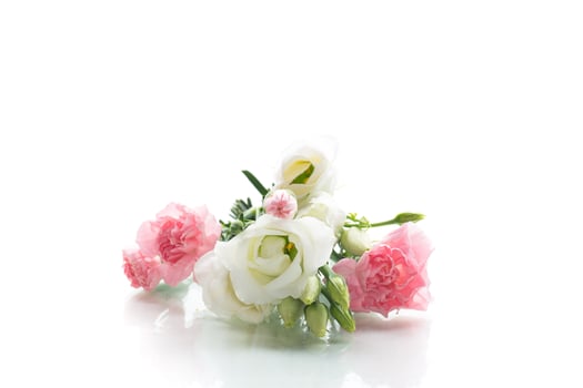 Bright small flower bouquet isolated on white photo