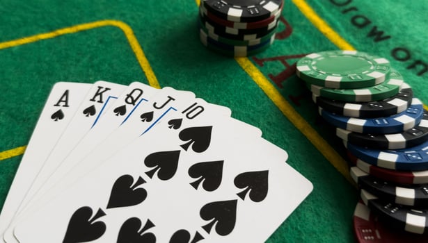 Chips are colored for poker and playing cards on the poker table. poker. casino. win. photo