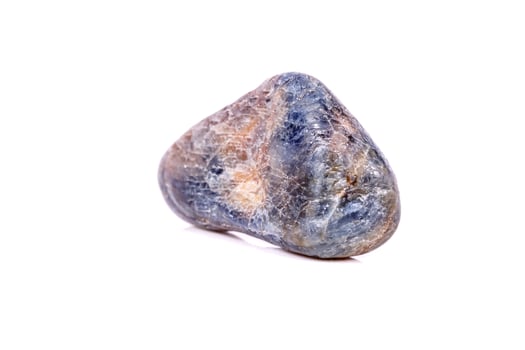Macro mineral close-up stone sapphire on white background photo