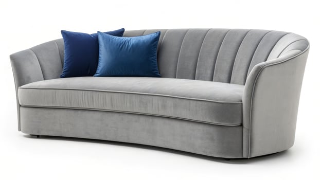 Elegant sleek grey sofa with plush pillows modern living room interior design cozy ambiance stylish comfort photo