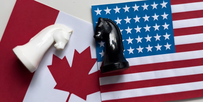 USA flag and Canada flag print screen on pawn chess with white background.It is symbol of tariff trade war tax barrier between United States of America and Canada. photo