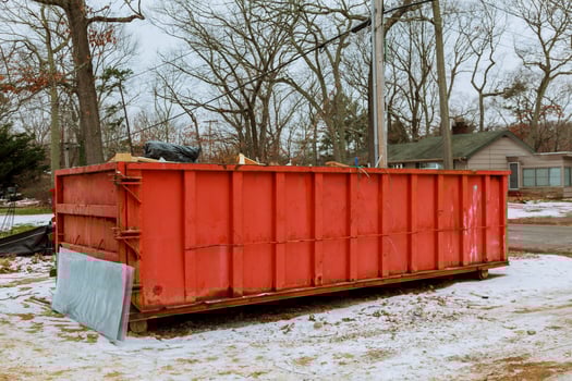 Trash bin at the side of street in winter with lip garbage container winter snow photo