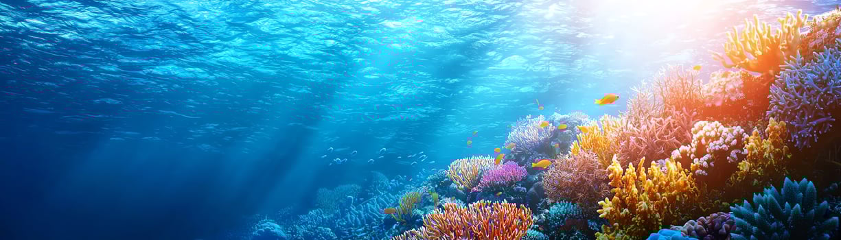 Vibrant underwater scene showcasing coral reefs, diverse marine life, and clear blue water, illustrating the beauty and fragility of ocean ecosystems. photo