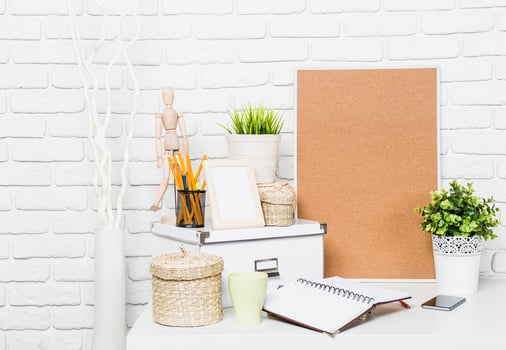 Workspace setup featuring stationery, decor, and organization elements for a productive environment photo