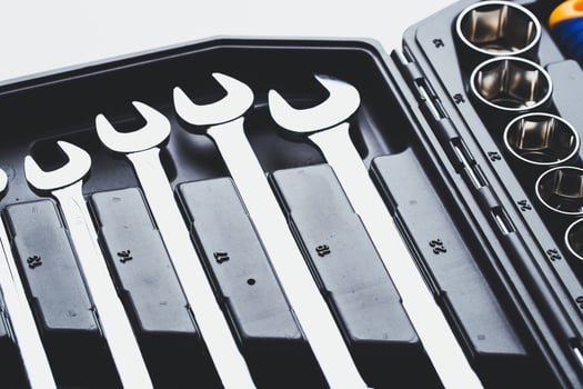 High-quality set of wrenches organized in a compact tool box for mechanics and DIY enthusiasts photo