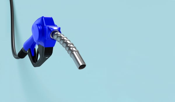 Blue w fuel nozzle on light blue background photo