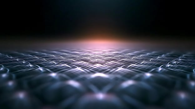 Abstract close-up of a textured surface with illuminated patterns and a soft glow in the background photo