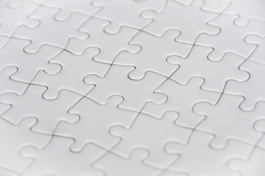 Side view of white jigsaw puzzle photo