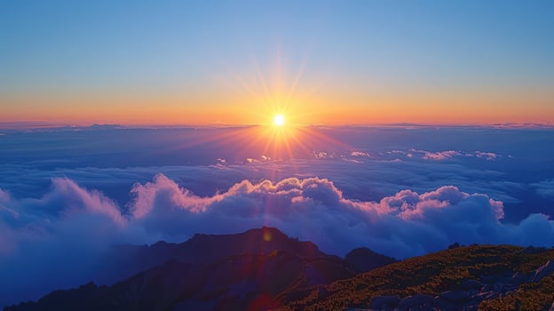 Sunrise over majestic mountains with clouds, creating a serene and vibrant landscape scene photo