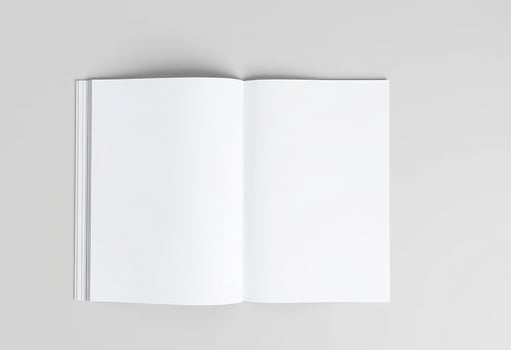 A blank white hardcover magazine template on a gray background photo