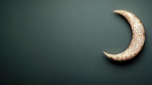 Ornate crescent moon decoration against a dark green backdrop, evoking tranquility and elegance photo