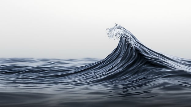Majestic ocean wave curling gracefully against a serene horizon at dusk, evoking tranquility photo