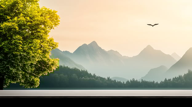 Serene landscape featuring a majestic tree by a tranquil lake with mountains and an eagle soaring photo