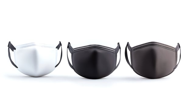 Three stylish face masks in white, black, and dark brown arranged on a clean background photo