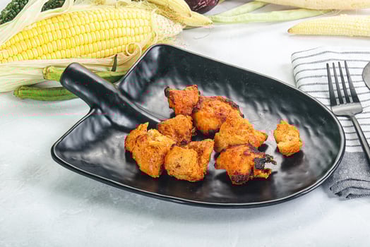 A plate with some food on it and a fork photo