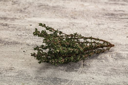 A bunch of herbs on a table photo