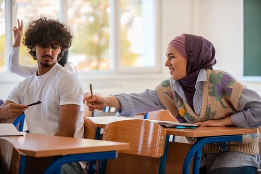 In the classroom group of diverse college students engages in discussion and knowledge exchange. photo