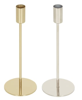 gold colored iron candlestick cut out isolated white background with clipping path photo