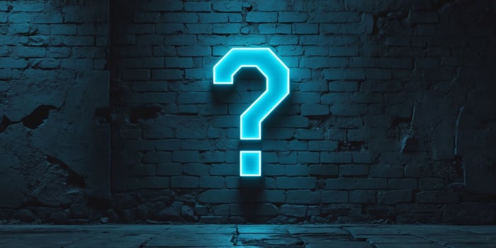 Glowing Neon Blue Question Mark on Dark Brick Wall in Cyberpunk Urban Art Style. photo