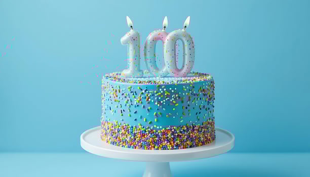 Century Celebration Blue Birthday Cake with 100 Sparkling Candles food party sweet white plate happy photo