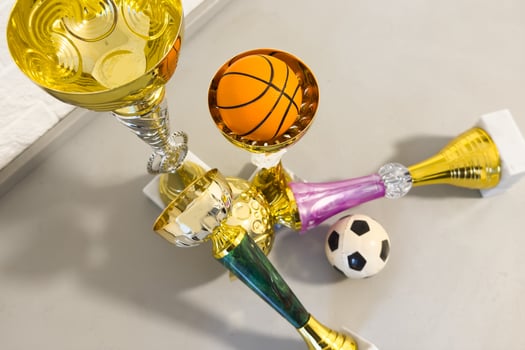 Cups of winners award, Sport equipment and balls photo