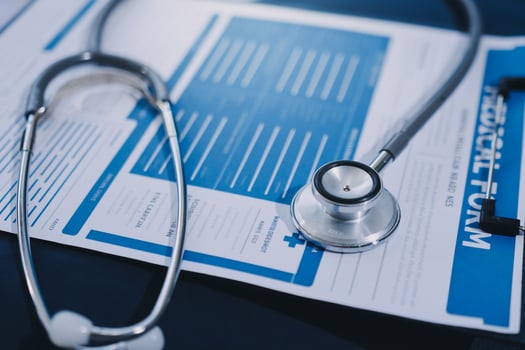 A stethoscope on a medical form photo