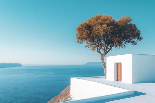 Lonely tree growing near white house overlooking Santorini caldera photo