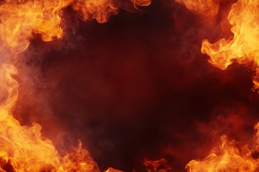 A dynamic display of fiery energy with flames framing a dark, smoky center. Space for your design photo