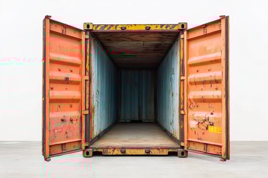 Open shipping container with rusty orange doors photo