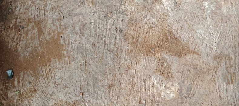 A close up of a wooden surface with a hole in it photo