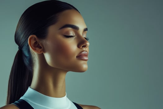 Elegant woman with closed eyes poses gracefully in a neutral-toned setting during a photoshoot focused on beauty and serenity photo