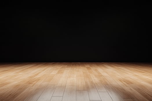 Elegant brown wood flooring against a plain black wall creates a contrast. Minimalist photo