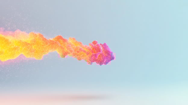 Vibrant abstract smoke or vapor cloud in shades of orange and pink against a soft blue background photo