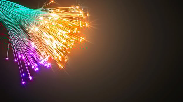 Vibrant fiber optic strands glowing in various colors against a dark background, symbolizing technology photo