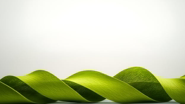 Vibrant green ribbon-like leaves elegantly twisting against a soft white background photo