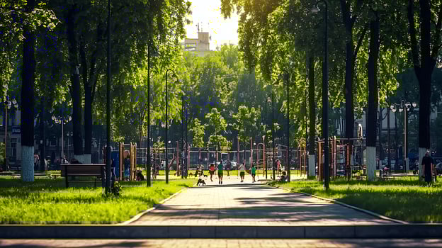Vibrant park scene with children playing and lush greenery under a sunny sky photo