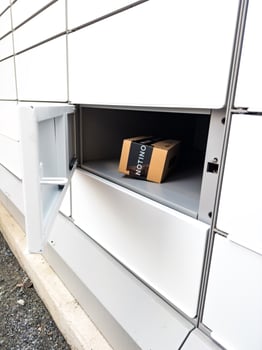 Prague, Czech Republic - January 31, 2025. Open Zasilkovna parcel locker with Notino package photo