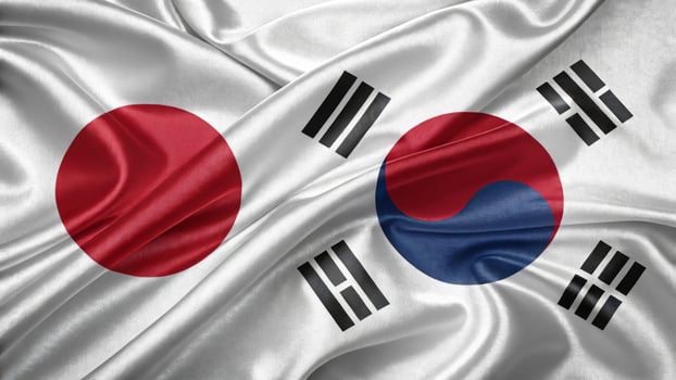 Flags of Japan and South Korea Representing National Unity and Friendship photo