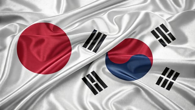 Flags of Japan and South Korea Representing National Unity and Friendship photo