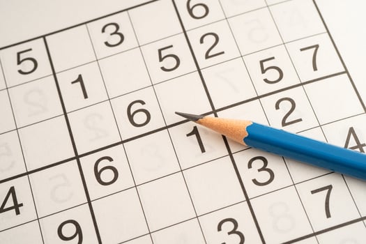 Sudoku puzzle game playing photo