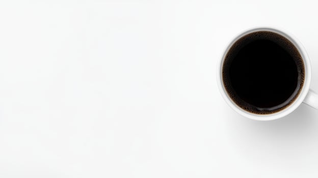 Freshly brewed black coffee in a white cup on a table photo