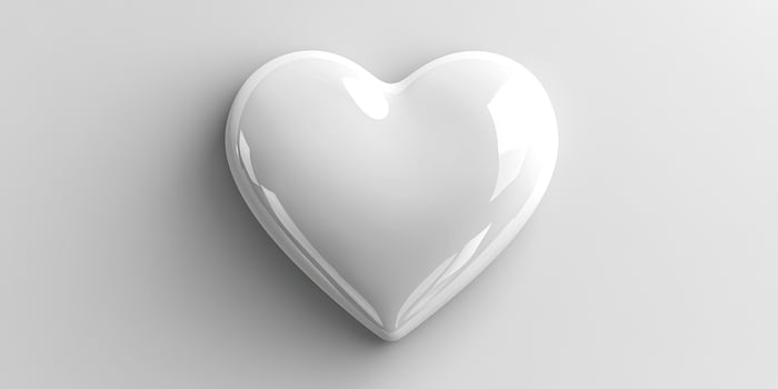 Glossy white heart shape on minimalistic background symbolizes love and affection in modern design context photo