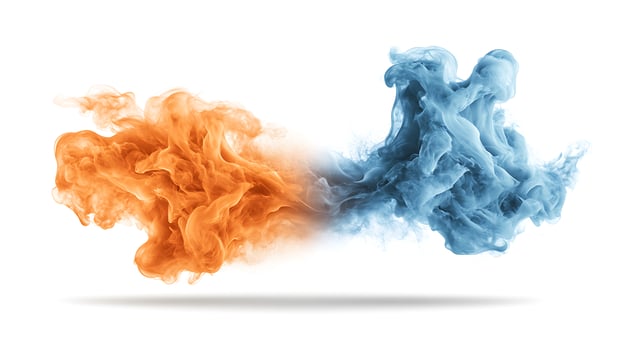 Two orange and blue smoke in water photo