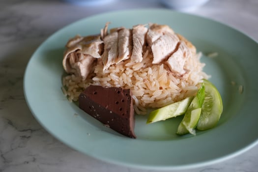 Chicken Rice is a traditional Asian dish that perfectly. photo