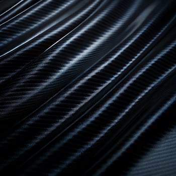 Closeup of a sophisticated carbon fiber texture with flowing lines. photo