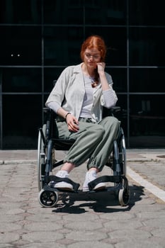 In front of a modern corporate building, a young woman sitting in a wheelchair confidently, symbolizing empowerment, inclusivity, and the strength to overcome challenges in the business world photo