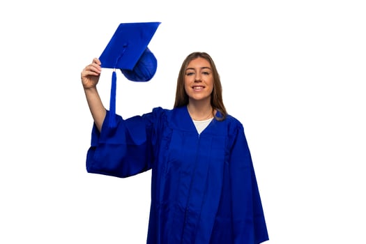 Happy graduating student holding graduation cap on white background photo