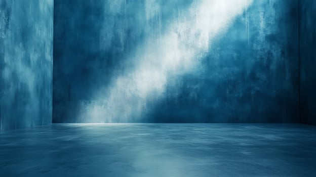 Abstract architectural space with monochromatic blue hues and striking light play, creates dramatic depth and artistic atmosphere. photo